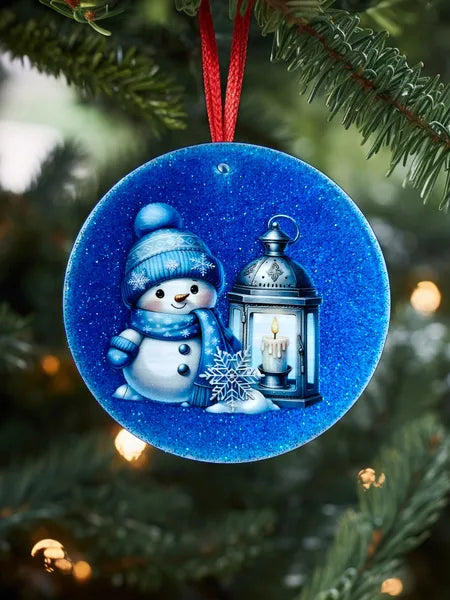 Boule plate plexi et résine Noël fond bleu