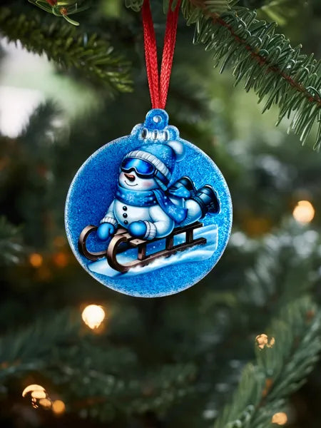 Boule plate plexi et résine Noël fond bleu