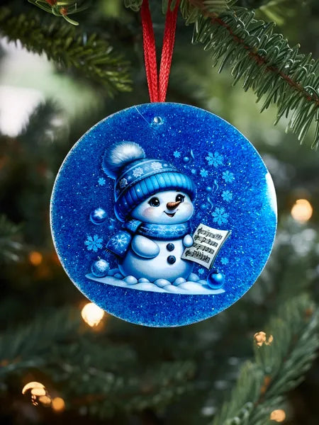 Boule plate plexi et résine Noël fond bleu